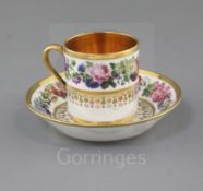 A Sevres porcelain coffee can and saucer, c.1820, each finely painted with a garland of flowers