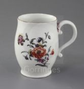 A Derby ovoid mug, c.1758, painted in 'Cotton-stem painter' style with a loose bouquet of flowers