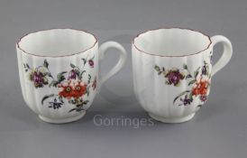 Two Derby ribbed coffee cups, c.1758, each painted in 'Cotton-stem painter' style with a loose