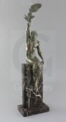 Pierre La Faguays. An Art Deco green patinated spelter figure, 'La Gloire', seated holding a laurel