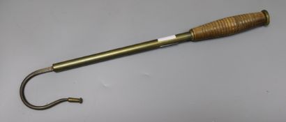 A Victorian brass and steel gaff, with ring turned handle, 46cm