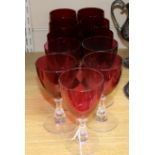 A collection of eleven various red bowled wine glasses