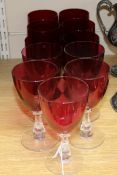 A collection of eleven various red bowled wine glasses