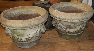 A pair of reconstituted stone garden planters W.50cm