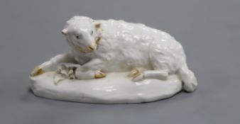 A Derby figure a recumbent sheep, c.1765, highlighted in gilt, l. 11.3cm, losses to