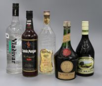 Five assorted bottles of spirits, Vlakivar vodka, Cointreau, Captain Morgan rum