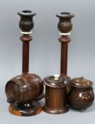 A pair of Victorian treen and ivory candlesticks, 21cm, two string boxes and a cauldron shaped match