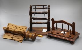 An early 19th century mahogany reel stand and two silk / wool winders Tallest 20cm.
