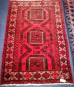 A Persian red rug