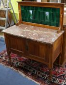 An early 20th century marble top washstand W.91cm