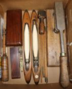 A group of assorted treen tools, etc. including two spindles, a turned ruler and two sets of scales