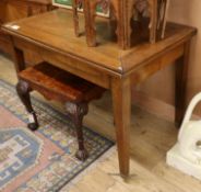 A 19th century mahogany folding dining table W.111cm