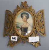 A 19th century portrait miniature watercolour on paper of a Greek woman, brass frame