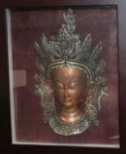 A copper relief and Thai princess in light up display case