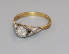 A Bravingtons 18ct gold and platinum, illusion set single stone diamond ring with diamond set