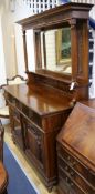 A Victorian carved walnut sideboard with mirrored superstructure W.145cm