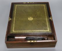A Victorian brass bound rosewood writing box 35cm wide, 23cm deep, 13cm high