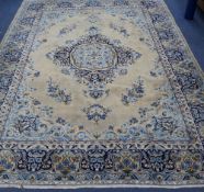 A Persian Kirman carpet 320 x 223cm