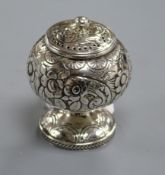 A George III embossed silver pounce pot, of spherical pedestal form on circular foot, London 1818, W