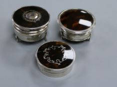 Three circular silver and tortoiseshell trinket boxes, two with pique decoration, including one with