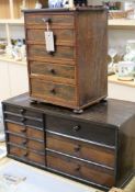 A miniature chest of drawers and another