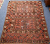 A Turkoman red ground rug 183 x 141cm