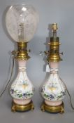 A pair of opaline enamelled oil lamps converted to table lamps and a glass shade 50cm high