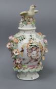 A Derby frill vase and cover, c.1760, of baluster form, the cover with bird finial, the floral-