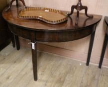 A pair of George III mahogany 'D' end dining tables W.124cm