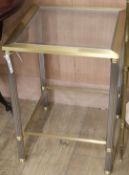 A Maison Jansen style brass and glass two tier occasional table W.43cm