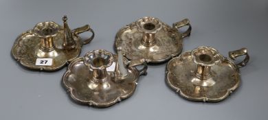 A set of four 19th century cusped rim chambersticks, three with associated snuffers 14.3cm