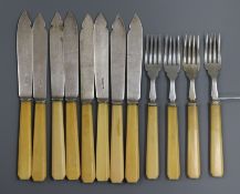 Eight mid 20th century ivory handled silver fish knives and four fish forks by Wilson & Gill.