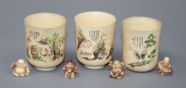 Three Chinese ivory cups, Republic period and four Japanese miniature ivory figures of immortals