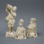 Three carved ivory Japanese figurines