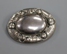A Georg Jensen sterling silver planished oval brooch, no. 119, 55mm.