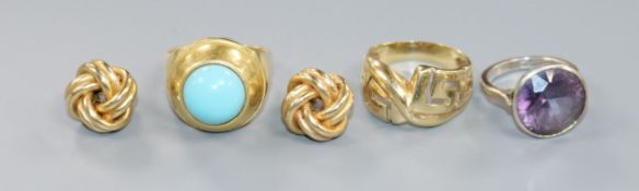 A Middle Eastern 750 yellow metal and turquoise ring, a yellow metal ring, one other ring and a pair