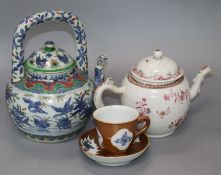 Two Chinese teapots and a cup and saucer Tallest teapot 23cm