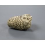 A Japanese ivory okimono of a quail