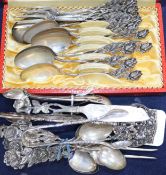 A small quantity of assorted Continental white metal flatware and a pair of English silver sugar