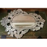 A Venetian style etched wall mirror W.65cm