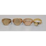 Three 9ct gold signet rings and an 18ct gold and gem set ring.