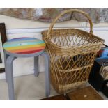 A wicker basket and a painted stool