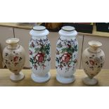 A pair of French 19th century opaline glass tall vases, decorated with rose sprays on a white ground