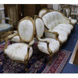 A Louis XV style giltwood nine-piece salon suite