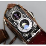 A Rolleiflex camera in carrying case