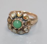 A 19th century yellow metal, cabochon cut emerald and rose cut diamond set cluster ring, size J.