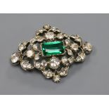 An early 20th century white metal, green and white paste set lozenge shaped brooch, 53mm.
