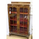 A lacquered walnut bookcase W.76cm