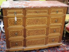 A French transitional style marble top four drawer commode W.130cm