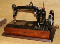 A Wheeler and Wilson MFG Co sewing machine c.1860
